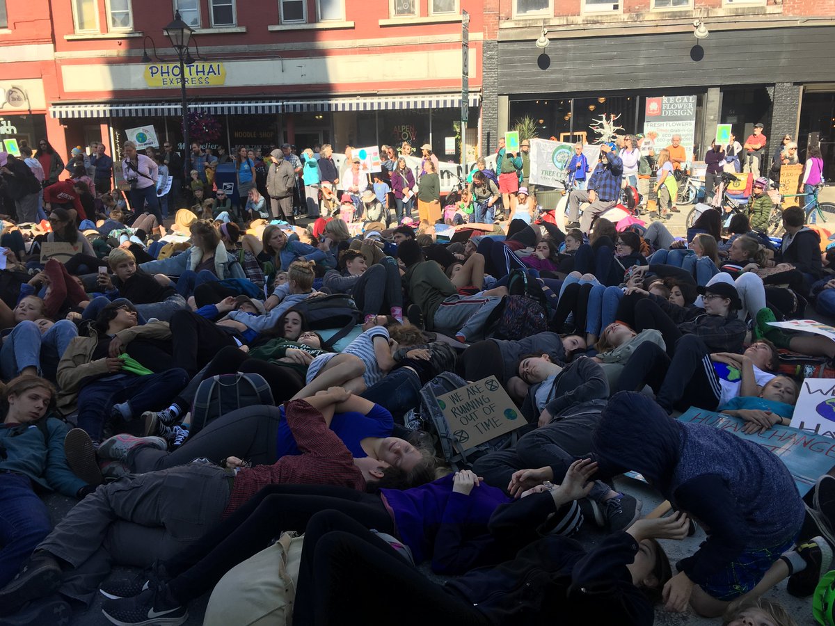 VNRCorg's tweet image. Vermont is keeping up with the #GlobalClimateStrike -- and not just in Burlington. Here's downtown Montpelier this morning, complete with a student die-in on Main Street. #VTClimateStrike #ClimateChangeSucks #ActOnClimateVT #vtpoli