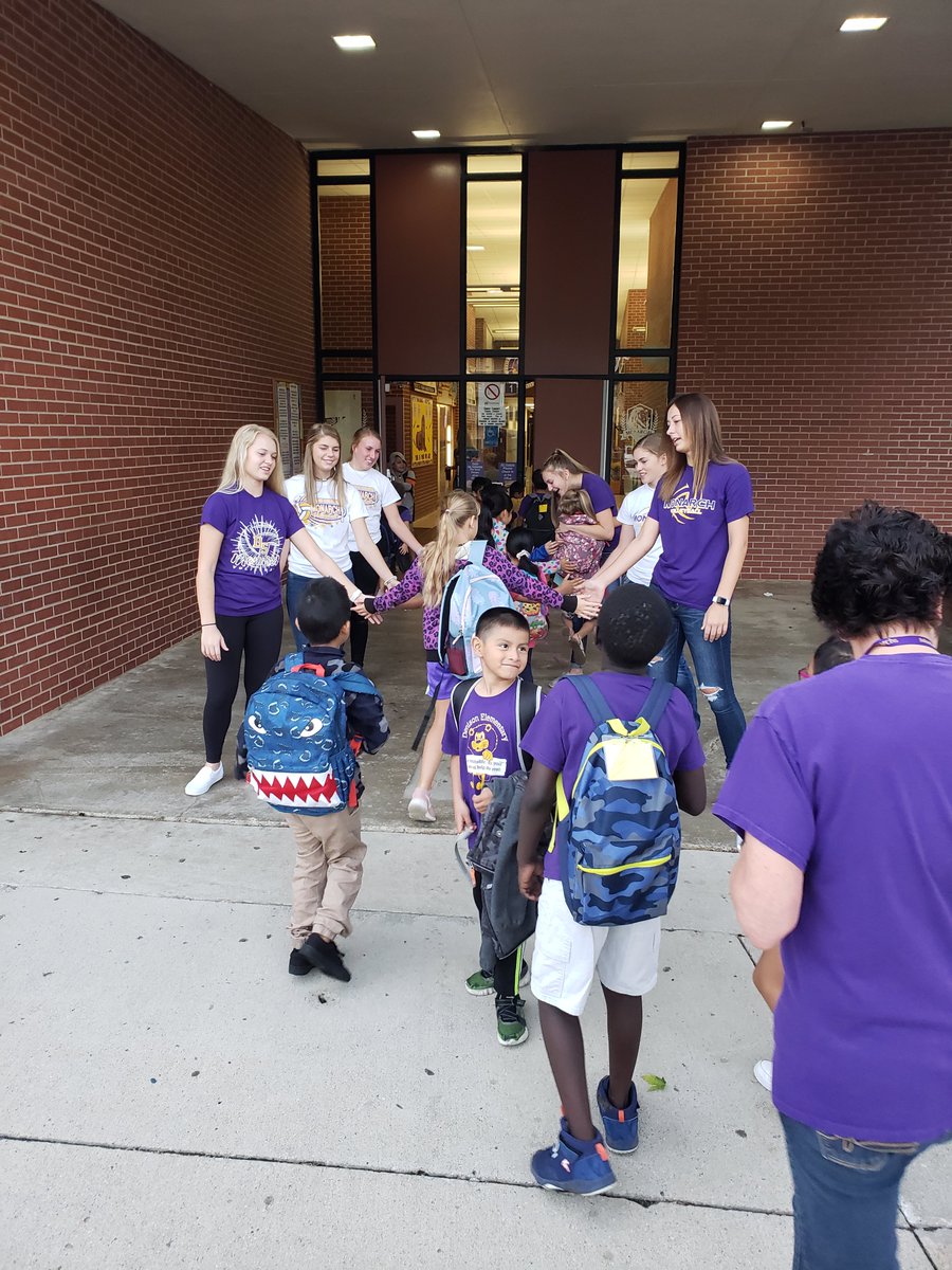 Monarch Volleyball Team welcoming students to the 20th Street Elementary School.  Next week the Monarch Cross Country team is scheduled.
