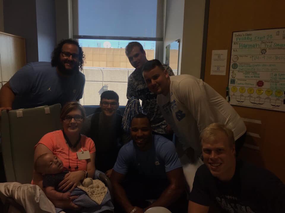JB10141997's tweet photo. My nephew, Maddox, was born two months premature and has spent most of his young life in the NICU at UNC Children’s Hospital. He just had an extensive &amp; successful surgery! Today,  some members of @TarHeelFootball visited him. It meant a lot to us! Thank you guys! #GoHeels https://t.co/UPbuEsIDRu
