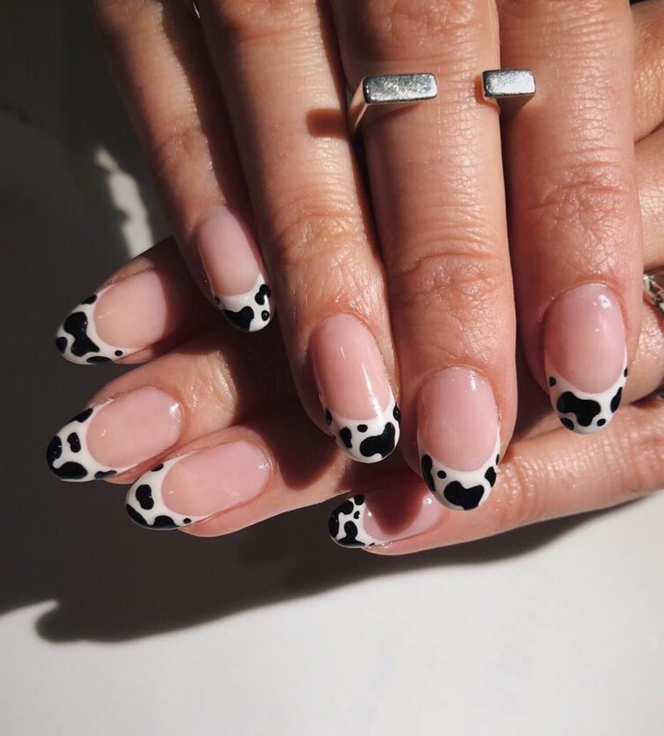 npdirect's tweet image. Animal print forever 🐄 Would you wear this MOO'd up cow print nail tip design? 💘 Nails by: @ladyfancynails #animalprintnails