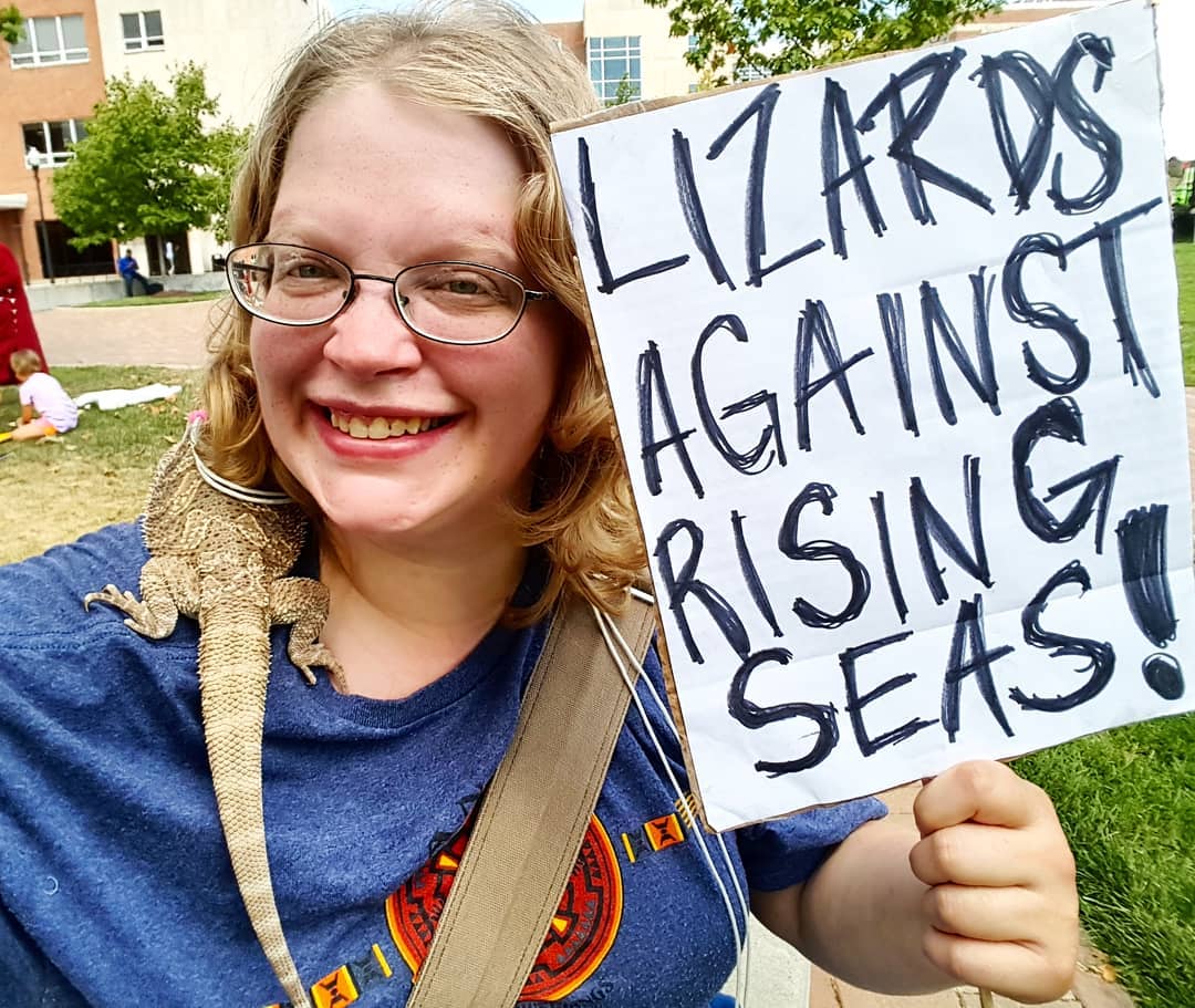 Lizards4Dems's tweet photo. Here's Mom and I at the #UDClimateStrike! I was hiding in her hair. #ClimateStrike #ClimateAction https://t.co/xGx722HGS1