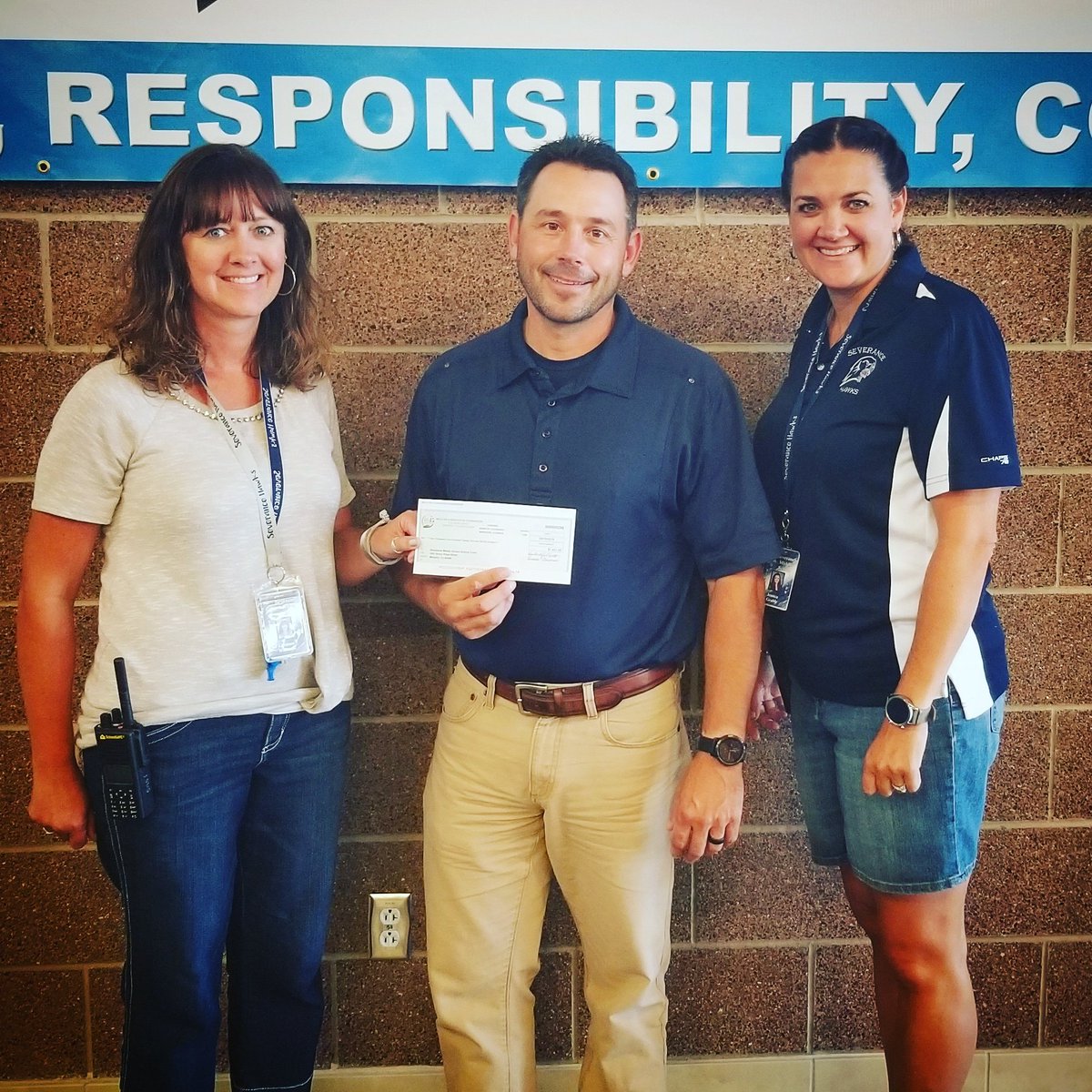 Thanks to the Weld RE-4 Education foundation for the check from the Flip Flop Gala! Our Hawk Flock appreciates you! #gohawks @weldre4education
