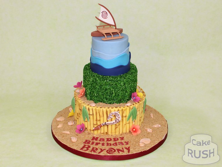 CakeRush's tweet photo. Bryony loves Moana, so we made this three-tiered cake decorated with bamboo, ocean waves, and the heart of Te Fiti! Sailing on top is Moana's boat - so far not stolen by Maui. Seashells complete the scene.

#Moana #cake #birthday https://t.co/J1BuQdIQAM