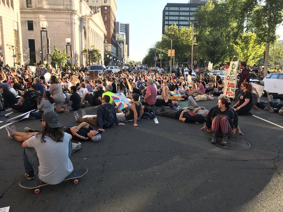 brizahn's tweet photo. And now a two minute die-in outside City Hall. #nhv https://t.co/JQApTHrCYE