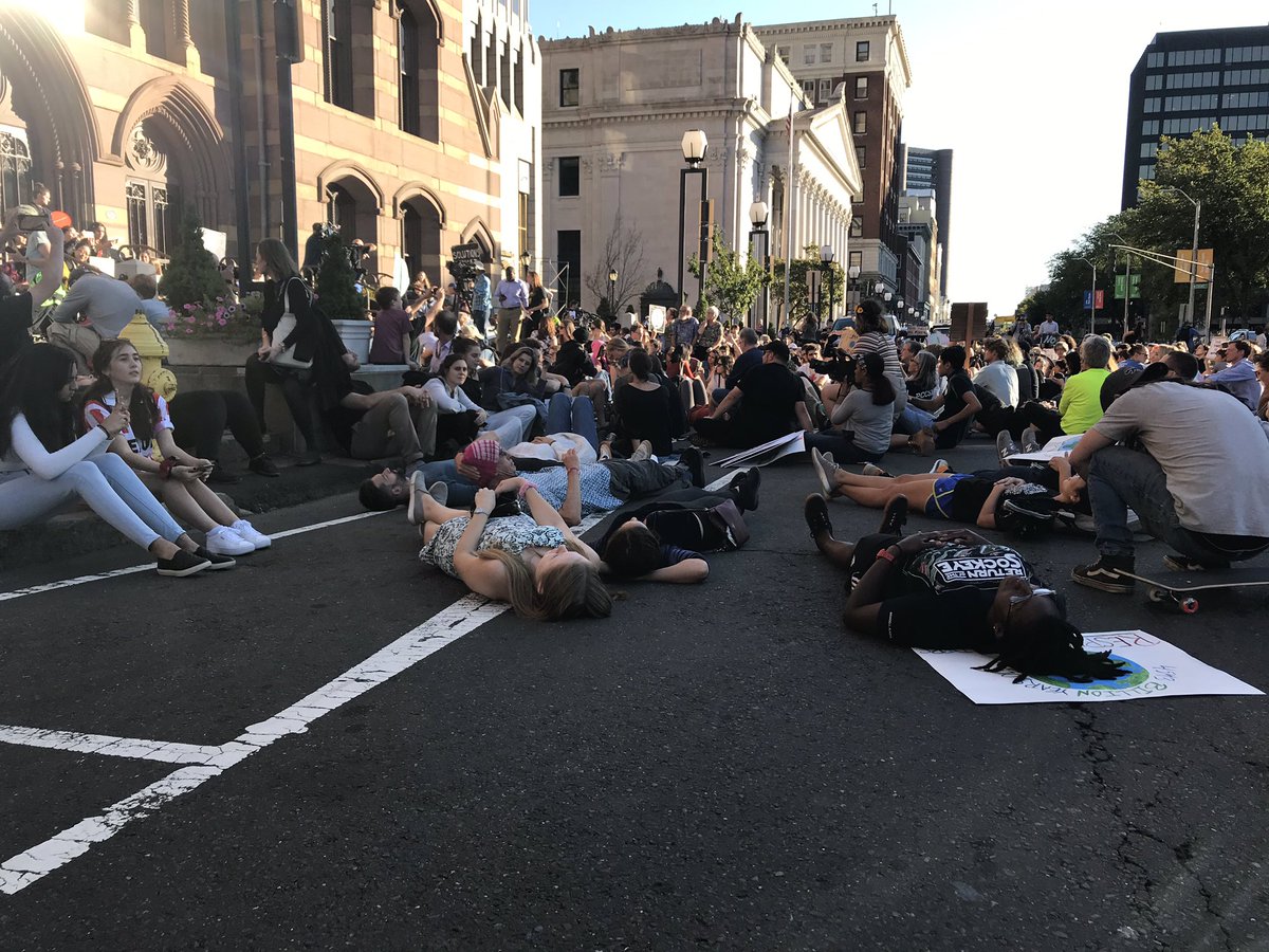 brizahn's tweet photo. And now a two minute die-in outside City Hall. #nhv https://t.co/JQApTHrCYE