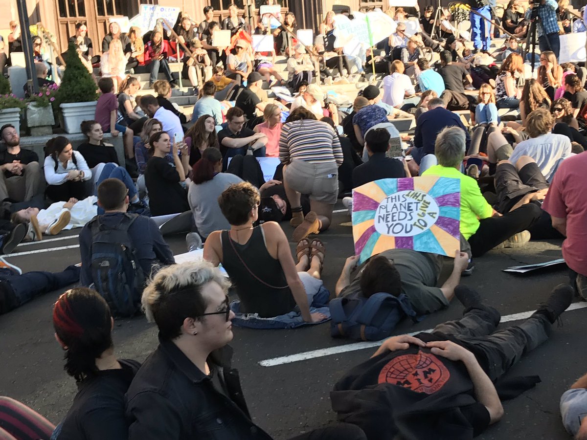 brizahn's tweet photo. And now a two minute die-in outside City Hall. #nhv https://t.co/JQApTHrCYE