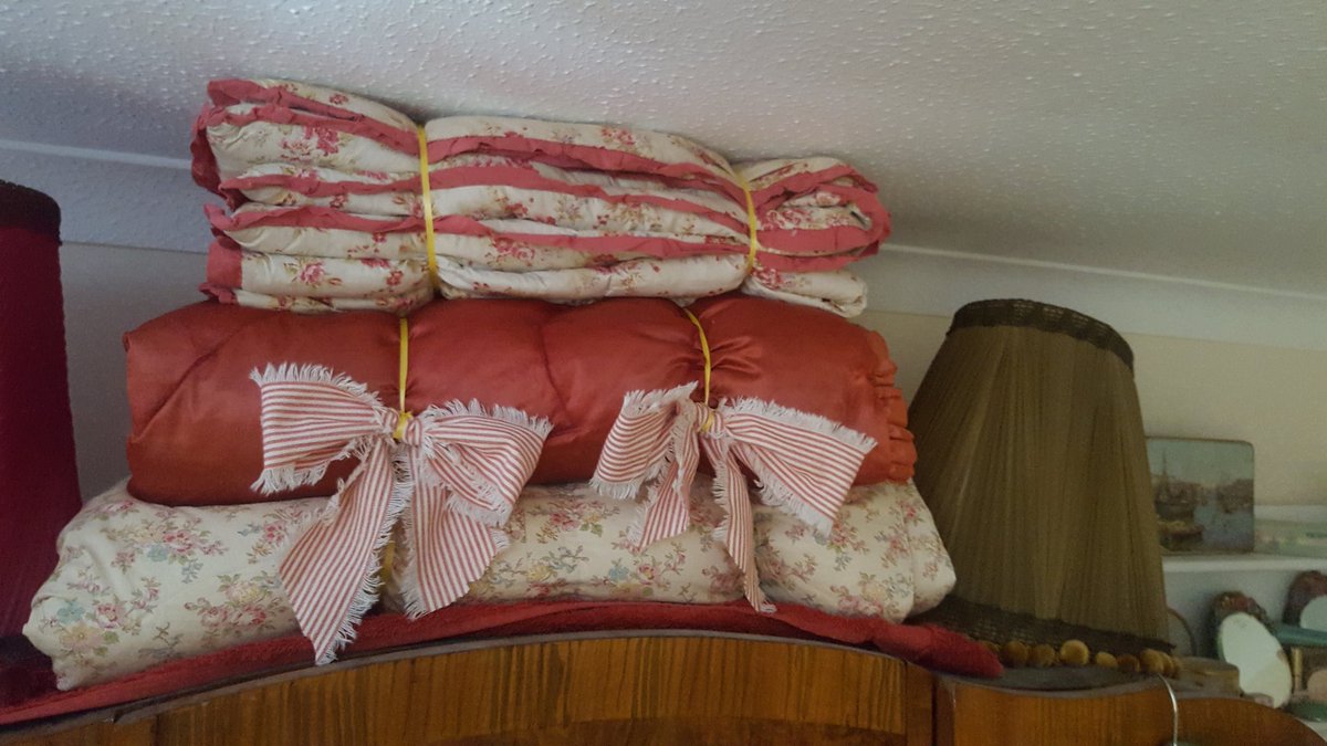 Thinking about adding vintage quilts to my bed tonight...