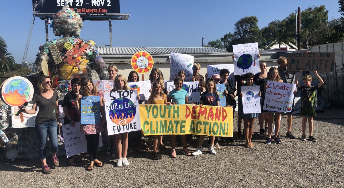 Kellie4E's tweet photo. These middle school students from Village Gate Academy led this morning’s #EncinitasClimateWalkoutandMarch 🌎 We are following your lead! https://t.co/zNlfLa2HS9