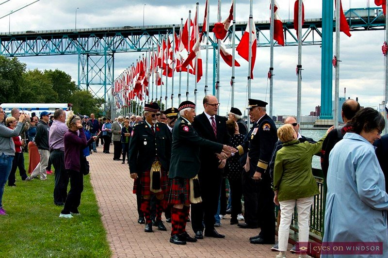 EyesOnWindsor's tweet photo. 128 Canadian Flags will be unfurled along Windsor’s riverfront tomorrow as tribute to the 128,000 Canadians killed and missing in action while serving our country (Sept 21), @VVOCFORWindsor starts at 1:30pm #YQG #FlagsOfRemembrance #LestWeForget https://t.co/4e6r5kBWPU https://t.co/vf89xSfvs9