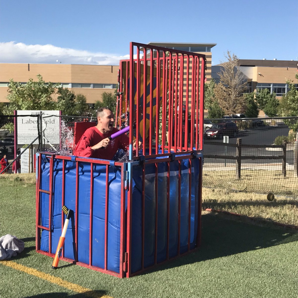 RegisJesuitHS's tweet photo. And Tricco goes down in the dunk tank! #RJHoCo #RJLife #RJTraditions https://t.co/VOdutV9i7p