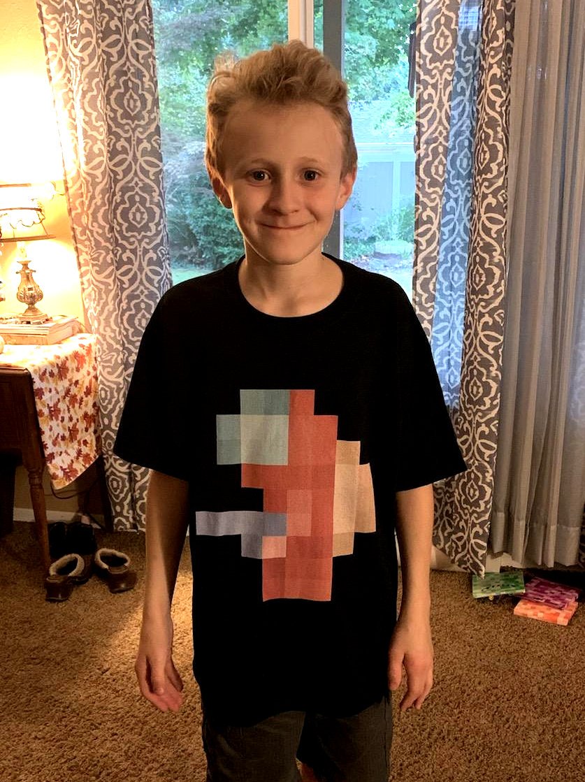 JustWallGames's tweet photo. @alWirehead my son is super stoked about his new shirt! #EvidenceOfLife https://t.co/ICGiJulY0L