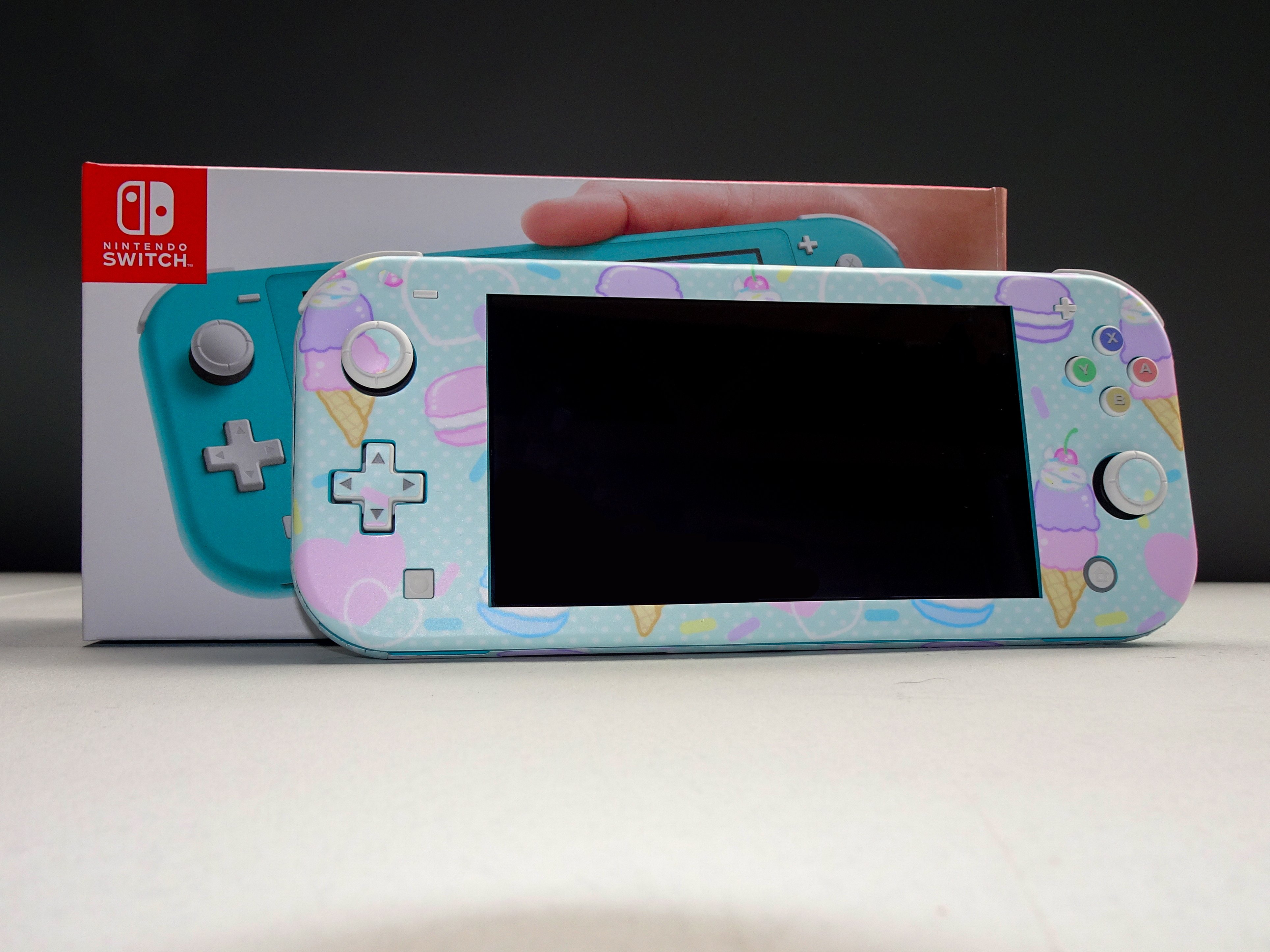 Nintendo switch lite обзоры. Nintendo Switch Lite. Кастом Нинтендо свитч Лайт. Нинтендо свитч Лайт 2022. Nintendo Switch Lite Custom.