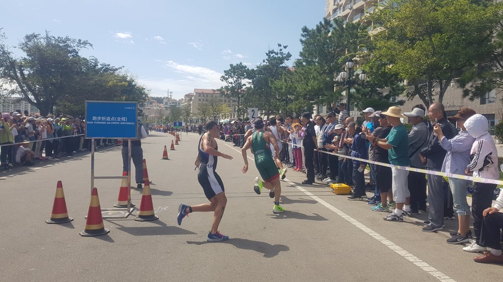 Conditions are warm, the pace is on and these Elite men are flying.
Australia's Ryan Bailie is hanging off the back and Mexico's Gonzalez has pulled back and now running behind.
The question remains: has anyone been smart with their tactics to conserve some in the tank to strike.