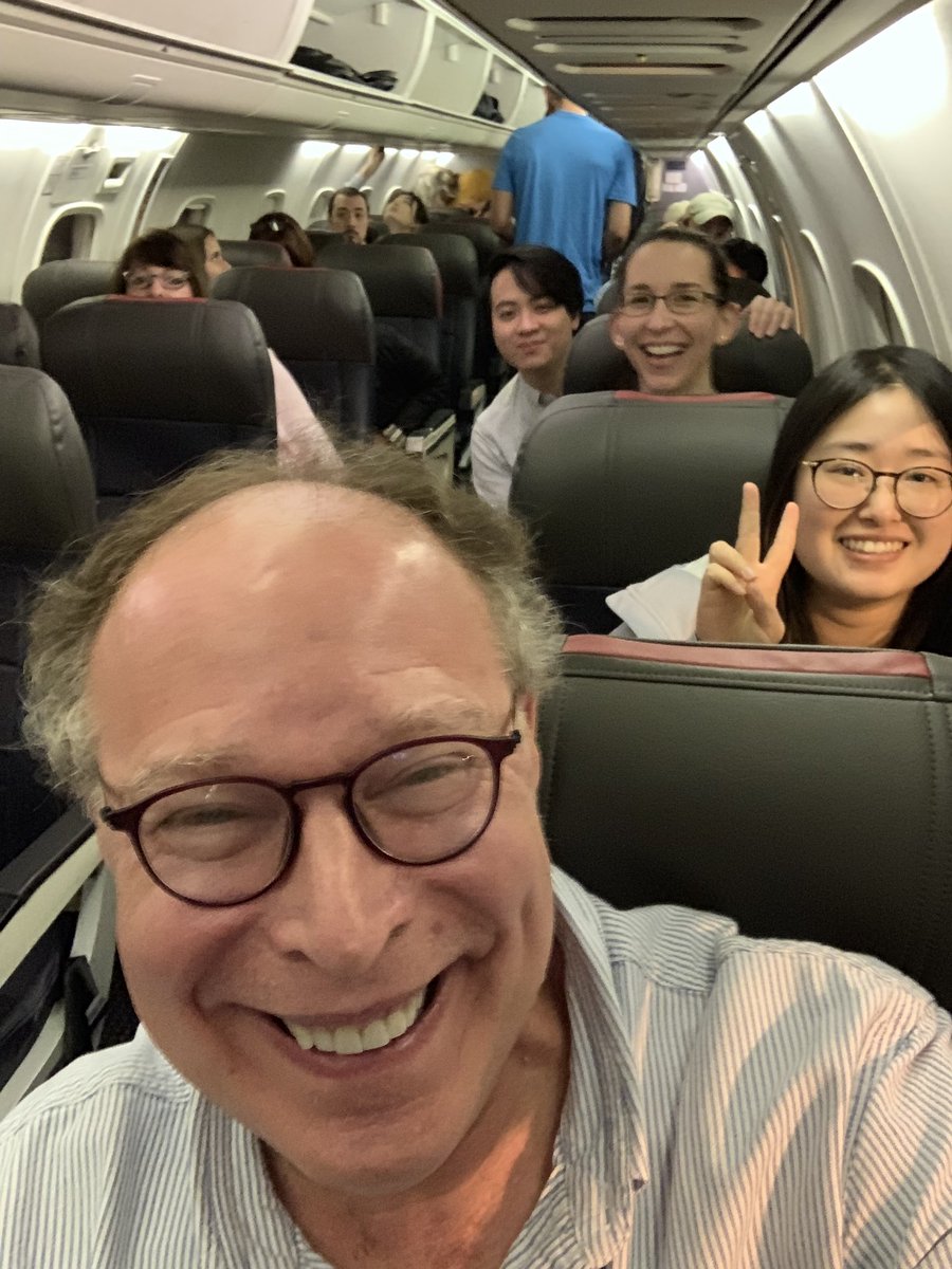 CancerCornell's tweet photo. Bob, Lu, Elizabeth and Matt lined up in a row on the flight back to Ithaca. #cornellpsoc #2019PSON https://t.co/QBQScdQoLK