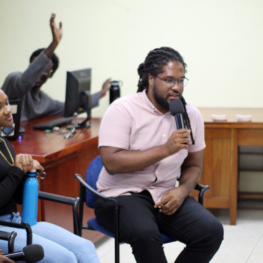 UWIMona_HumEdu's tweet photo. The wise words of Saeed Thomas, the man of many talents, were well received by the students at the “What Can I Do With My Humanities Degree?” Forum. 
Saeed stressed the importance of spending time to develop one's skills and talents. 

#HumanitiesFirst
#ForzaAzul
#EMHD https://t.co/5ft66op8x1