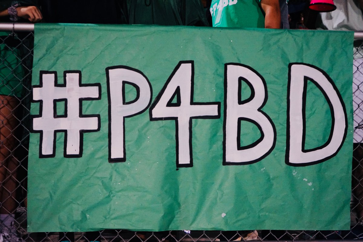 middelnews's tweet photo. Students from @CAHSTitans and @ShawneePublic wore green in honor of Bo Duren, a former Titan, at tonight's game. #P4BD #mdpurpose https://t.co/OHG84umsdl