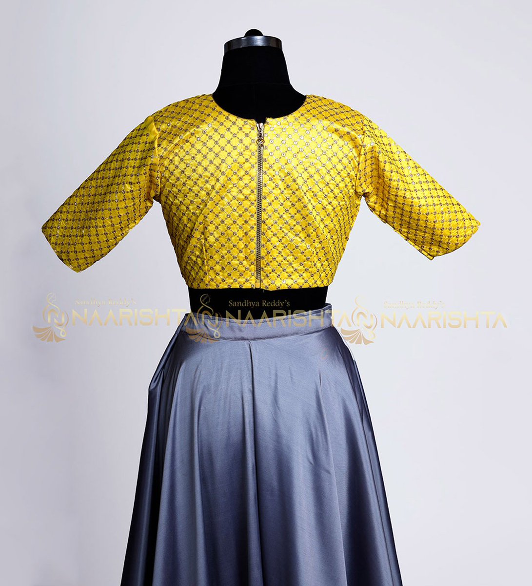 naarishta's tweet photo. Raise your desirability quotient and exude a look cut above the rest by gracing this grey flared #lehenga with #embroidered crop top designed exclusively at #Naarishta.

For more:https://t.co/lOdG2HQQiw

#silklehenga #blousetop #yellowblouse #croptop https://t.co/M5rsqHHqYS