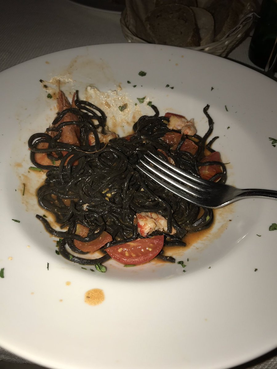 Squid ink 🦑 pasta 🍝 with prawns 🦐 and tomatoes 🍅