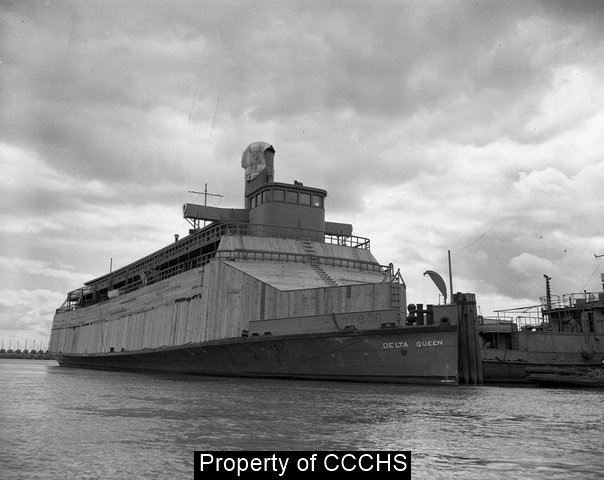 DQSteamboat's tweet photo. Did you know? In 1948, The Delta Queen was towed from California to New Orleans to return to passenger service after a stint with the U.S. Navy. She’s pictured here boarded up, battleship gray and prepped for the journey to the Mississippi. https://t.co/HvuDsPCcsq