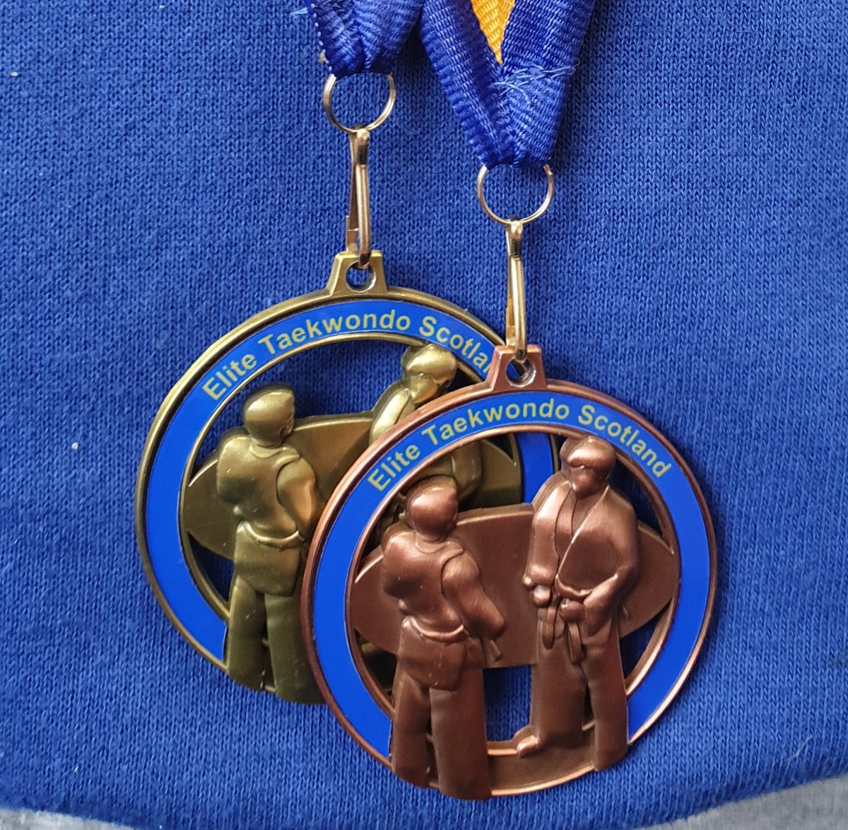 NewtongrangePS's tweet photo. Very proud of our P3 medal winner in taekwondo... bronze for fighting and gold for high kicks! #aspirebelieveachieve #feelingproud #talentedlearners #widerachievement https://t.co/164svV1eeq