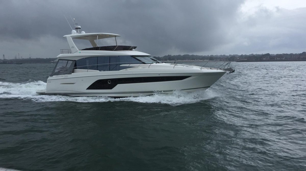nickhat_Anc's tweet photo. It may have been a grey day today but the @PrestigeYachts 590 still looked incredible! See her at @SotonBoatShow from Friday with the team @Ancasta_Group. https://t.co/F1XkLBzQcw