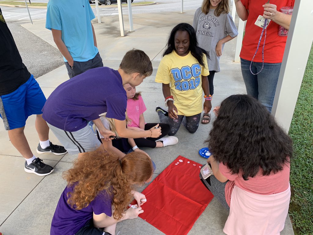 RCEMiddle's tweet photo. Students on #teamprowess❤️ were creating new #PantherHuddle🐾 flags this morning to kick off the new school year! #teamrce🐾 #loveourstudents💜 https://t.co/PeniBWVOHS