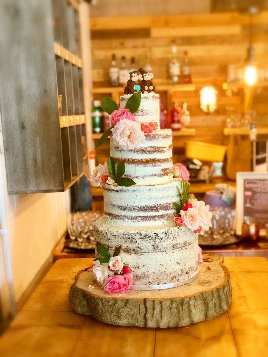 A 4 tiered wedding cake For the happy couple 👰 🤵 .
Bottom layer carrot cake 🍰 
Next red velvet 
The champagne and strawberries 
Top tier vanilla 🍓 🥂 
Semi naked white chocolate buttercream frosting 🧁 
Decorated with roses 🌹 
#weddingcake #somersetwedding #somersetchef