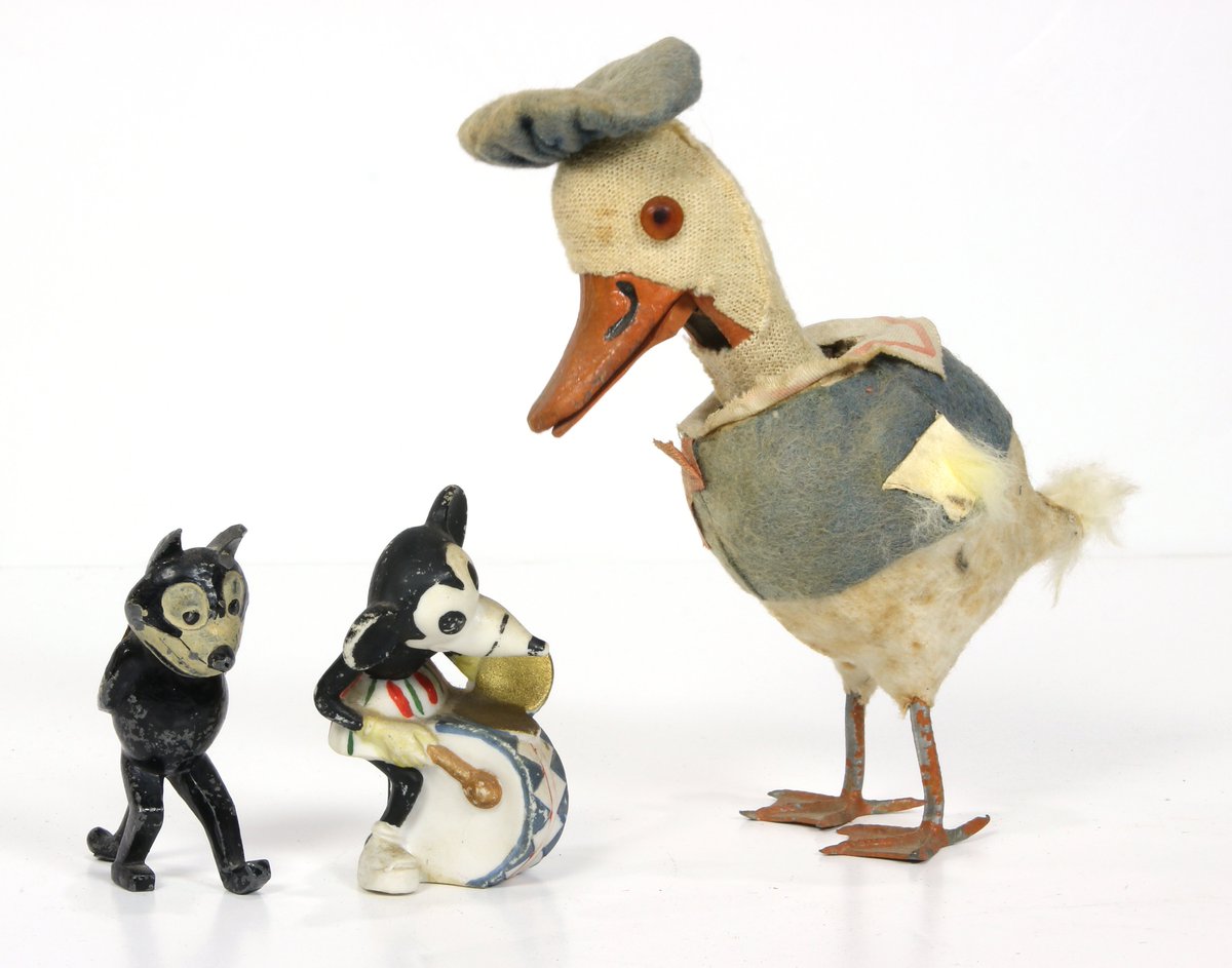 ClarsAuction's tweet photo. To be offered in our upcoming Saturday auction…#Vintage #cartoon cinema figurines, consisting of a German 1930's #MinnieMouse, a #Felixthecat figurine, together with an early #DisneyDonaldDuck bobble head. Come check out all the magic during Preview this #Fridaythe13th. #clars https://t.co/NHMhonF5vV