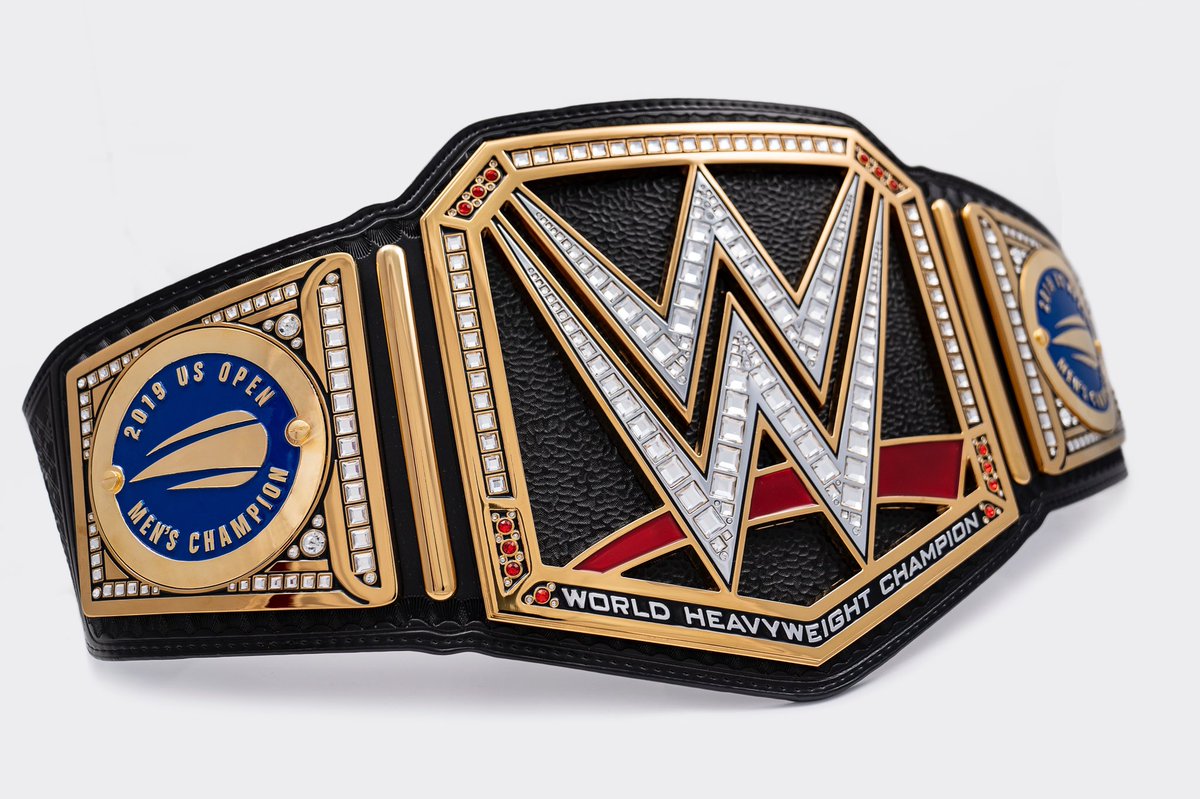 TripleH's tweet photo. An incredible end to 4 HOURS and 50 MINUTES in the finals of the @USOpen. Congratulations to @RafaelNadal…this custom @WWE Championship should help celebrate your 19th Grand Slam Title! https://t.co/jZy9nrm8JT