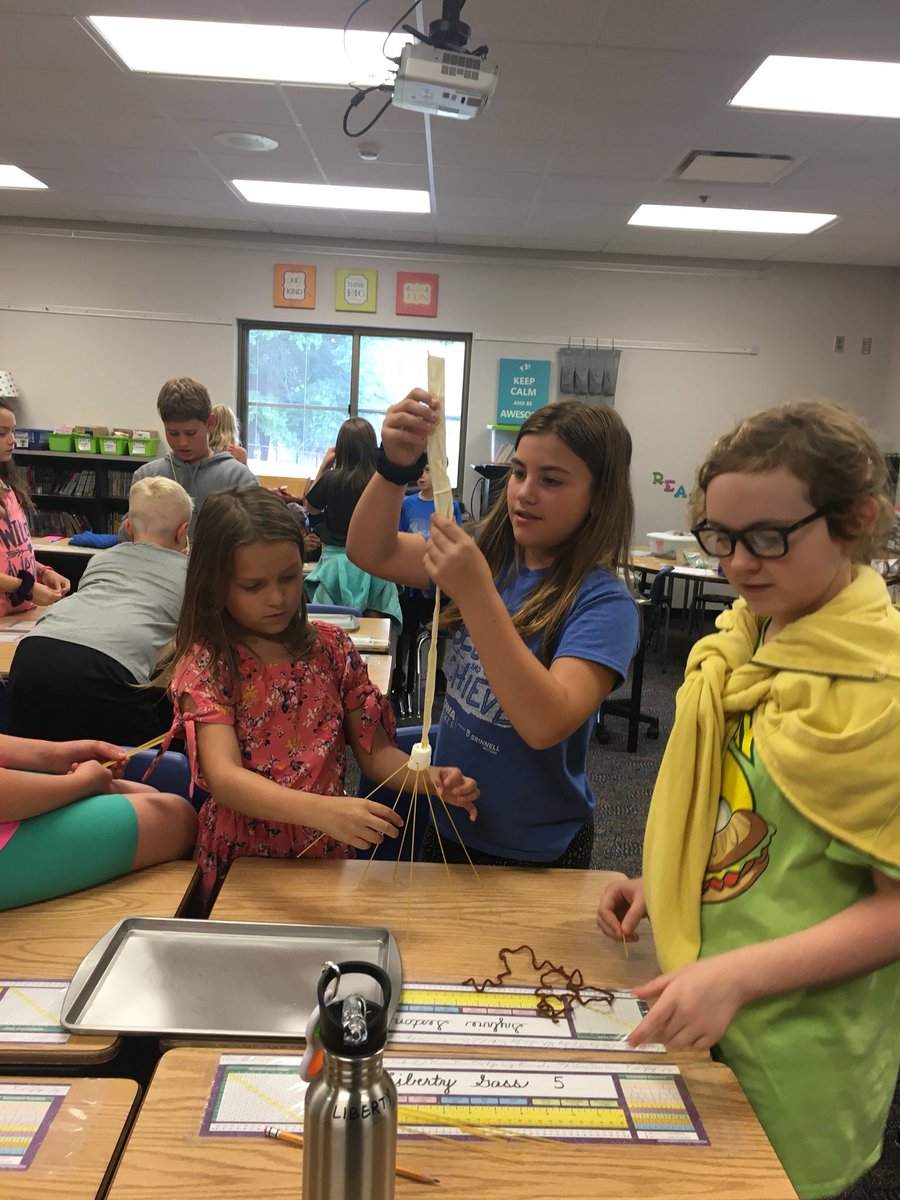 CedarHeights4th's tweet photo. STEM challenge! Create a freestanding tower with only spaghetti, marshmallow tape and string. #STEM #planning #teamwork #cedarheights4thgrade https://t.co/agaBNEUbBV