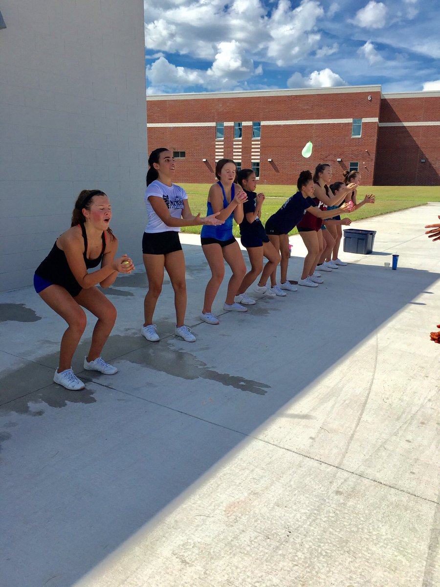 PCHSBullsCheer's tweet photo. We took it to the field today to run through our game day routines. If you haven’t heard, our first PCHS football game is this Thursday! These girls have been working hard and it was HOT 🥵 out there so they deserved a team bonding break! #cheerleaderchallenge #captainvscaptain https://t.co/8o1dpH4ff7