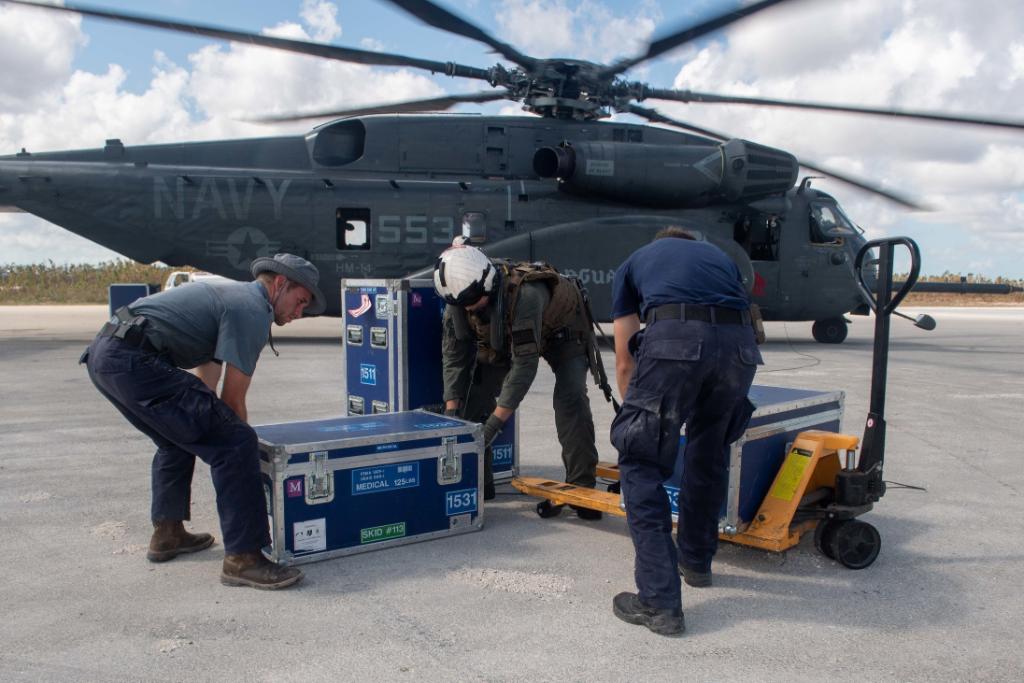 USNavy's tweet photo. #USNavy photos of the day: We team up with the @USCG to help medevac a patient in the #Bahamas, Sailors transport supplies in response to #HurricaneDorian, #USNSComfort provides care in Trinidad, and #USSOlympia returns home! ℹ️ info &amp; download ⬇️ https://t.co/PMtp2ULynN https://t.co/zqVchpyOH8