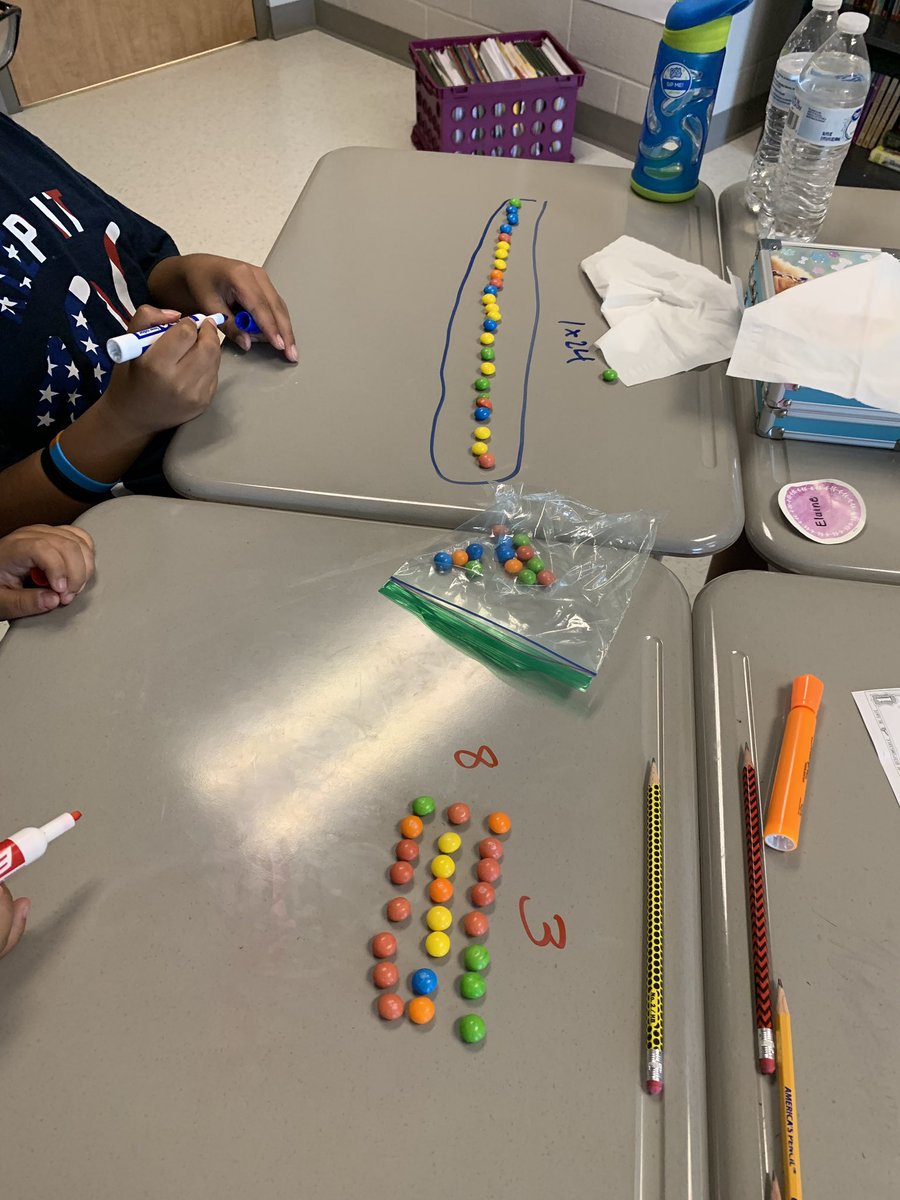BrennaWolfram's tweet photo. Explored finding factors today by building arrays and using skittles as our manipulatives! 🍬 https://t.co/F2YpqYh4x3