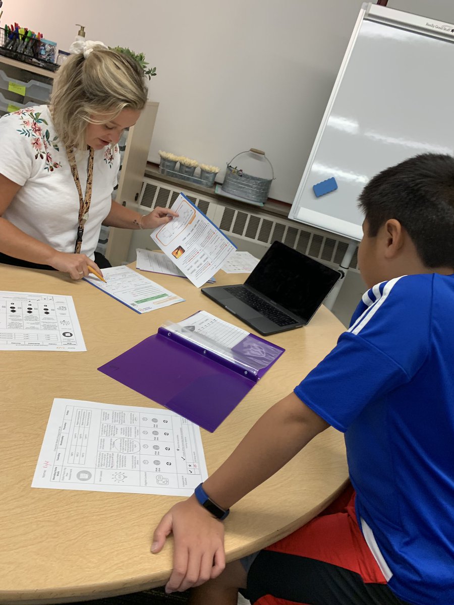 One of my favorite moments of the day was observing this data walk between <a href="/MsWards4th/">Michelle Ward</a> and one of her students to plan for his learning this week. #engage109 #sp109