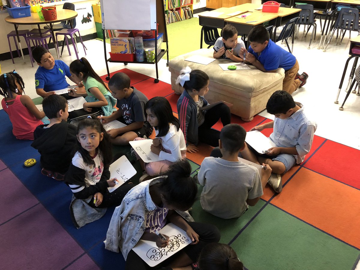 JCamery's tweet photo. We worked with turn &amp; talk partners to collaborate with each other to solve a division word problem as a warm up to our math workshop. These mathematicians rocked it!  #lovetoteachhere #CobbMath #ArgyleESPride @CobbMathDept @ArgyleElem @EngageNY @eureka_math https://t.co/74243X2nFY
