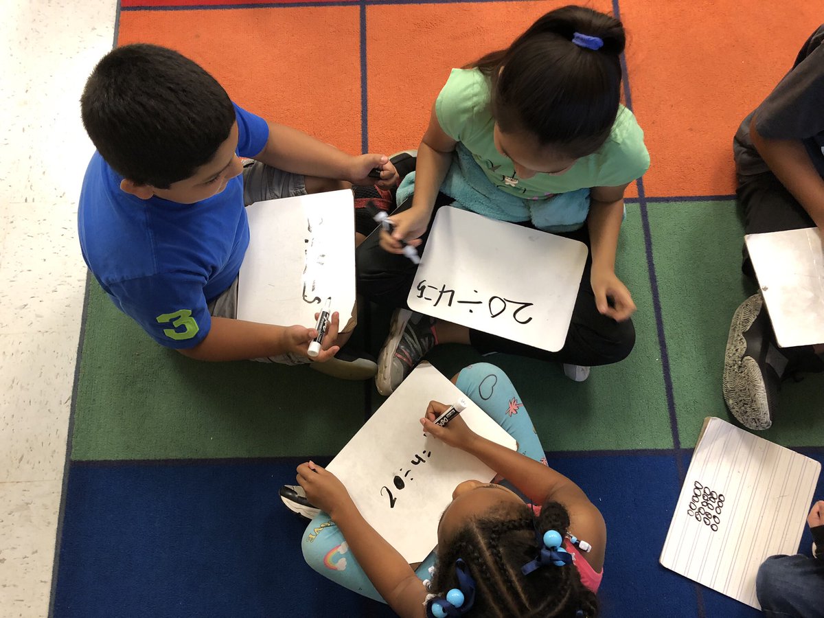 JCamery's tweet photo. We worked with turn &amp; talk partners to collaborate with each other to solve a division word problem as a warm up to our math workshop. These mathematicians rocked it!  #lovetoteachhere #CobbMath #ArgyleESPride @CobbMathDept @ArgyleElem @EngageNY @eureka_math https://t.co/74243X2nFY