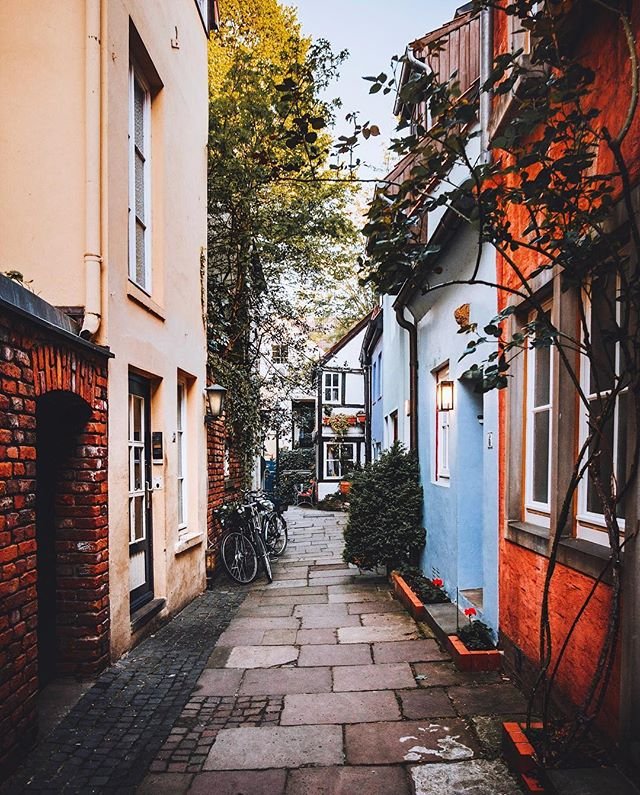 A neighborhood built to the human scale without cars or public transport could house 1000s of people, with ample sized homes on what today is a medium sized shopping mall parking lot, all buildings up to three stories tall, built to the edge of the plot. Forget about micro homes.