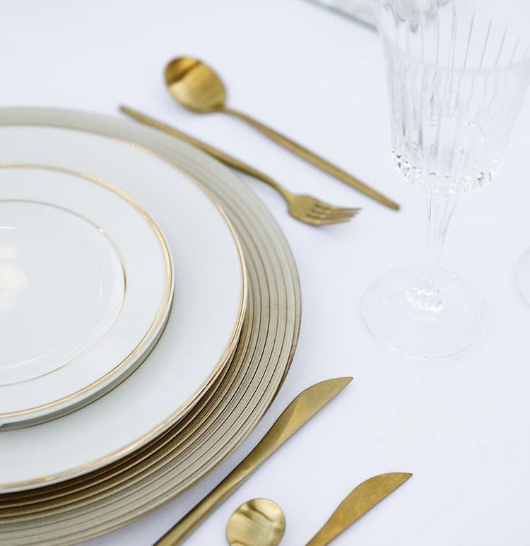 Our gold cutlery and charger plates gives any event an elegant and sophisticated charm✨ #weddinginspirations #uaewedding #saudiwedding #kuwaitwedding #qatarwedding #whitewedding #classicstyle #weddingplanners #weddinglove #dubaiwedding #designinspiration #ontrend #designlife