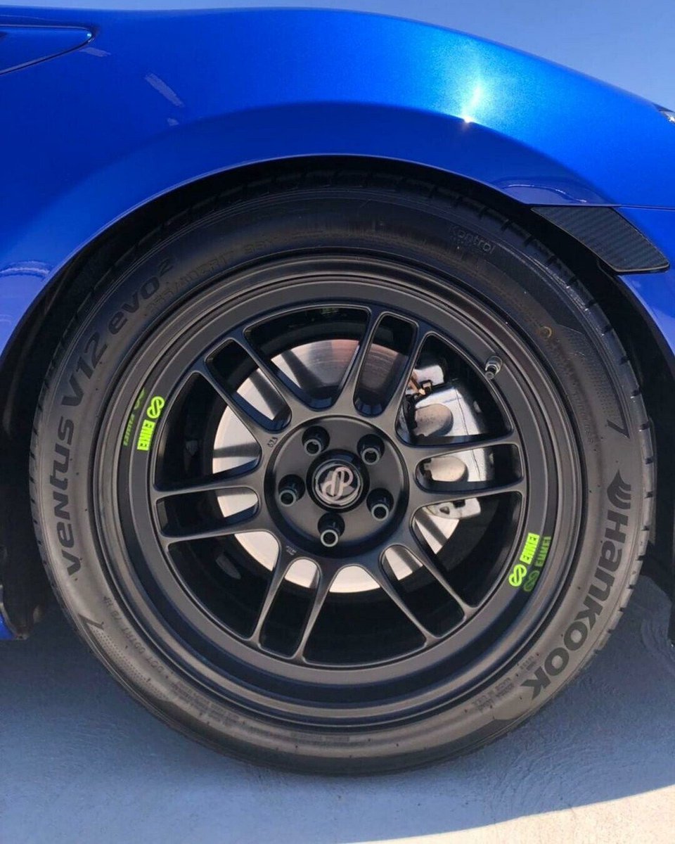 FlatOutGraphics's tweet image. We love fluorescent yellow with the Subaru WR Blue, this customer mixes it up by going with the stealthy purple Enkei logo on our center caps. 

Whatever look you're going for we can make it! Visit us at flatoutgfx.com to complete your look.