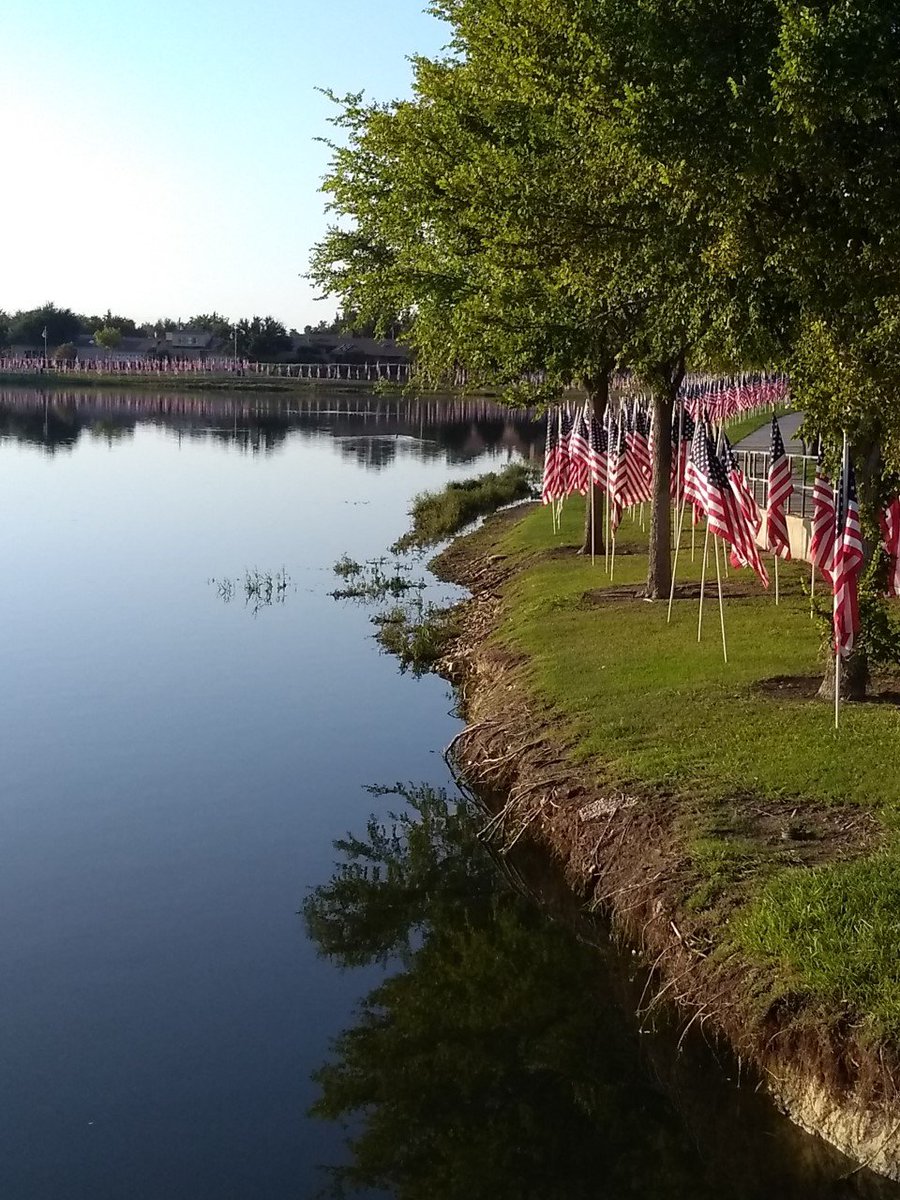 ScottieTakesOn's tweet photo. #ChangeOfSubject Hey @carolineheldman @ThomONeil1 At times my hometown of recent shooting fame gets something RT. 1 of THE BEST 9/11 memorials annually w/ 3000+ flags @ 1km around pond & now huge old sign renewal by local arts council. tbc.... https://t.co/SFlwvuy5JP