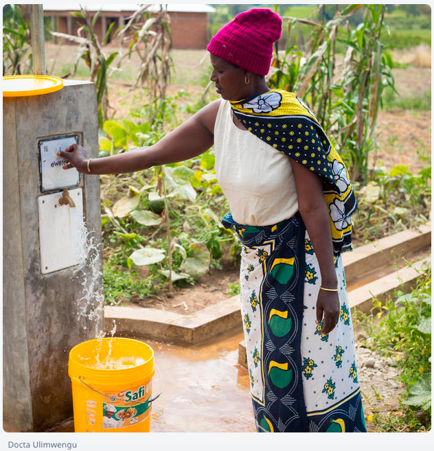 _eWATER's tweet photo. Community member, Asha Kimoro uses her #eWaterPay tag to collect water from a new water point, part of the @WaterAidTZ project in Sangara village, Tanzania. 

#WASH #SustainableWater #SafeWater #MobileMoney #WaterTechnology #SDG6 #GlobalGoals #ImpactInvestment #Water #IOT #NFC https://t.co/Pe6Pl9lZMs