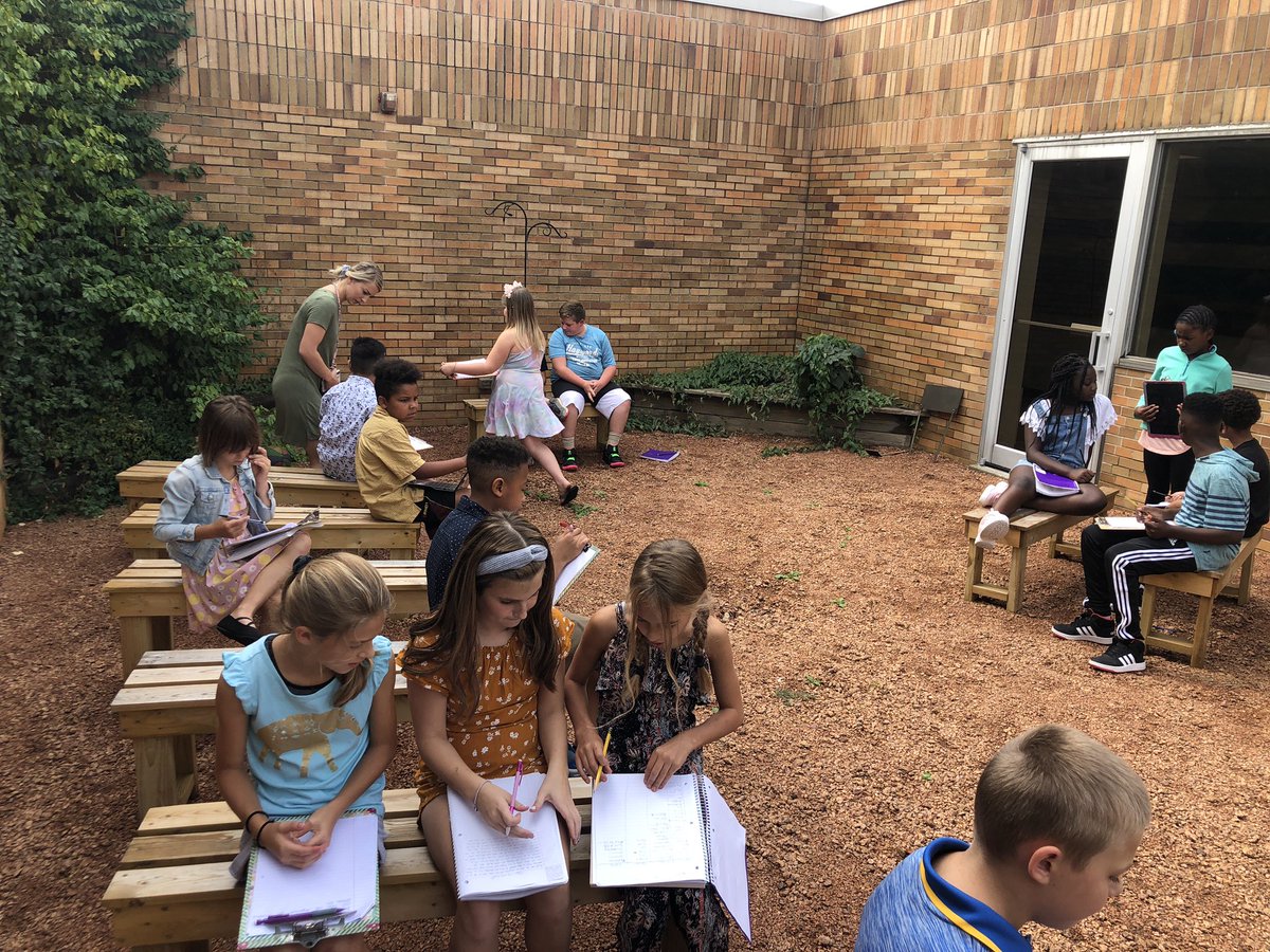 5th grade working on narrative writing in the outdoor courtyard. #followtheherd #learngrowthrive
