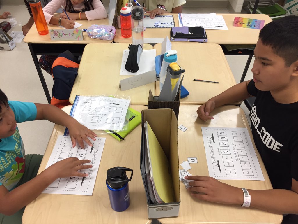 mswilson_dpcdsb's tweet image. Place Value Battleship 🚢. Students are learning to ask strategic questions and describe numbers. So many awesome strategies to determine their partner’s number! #dp_math