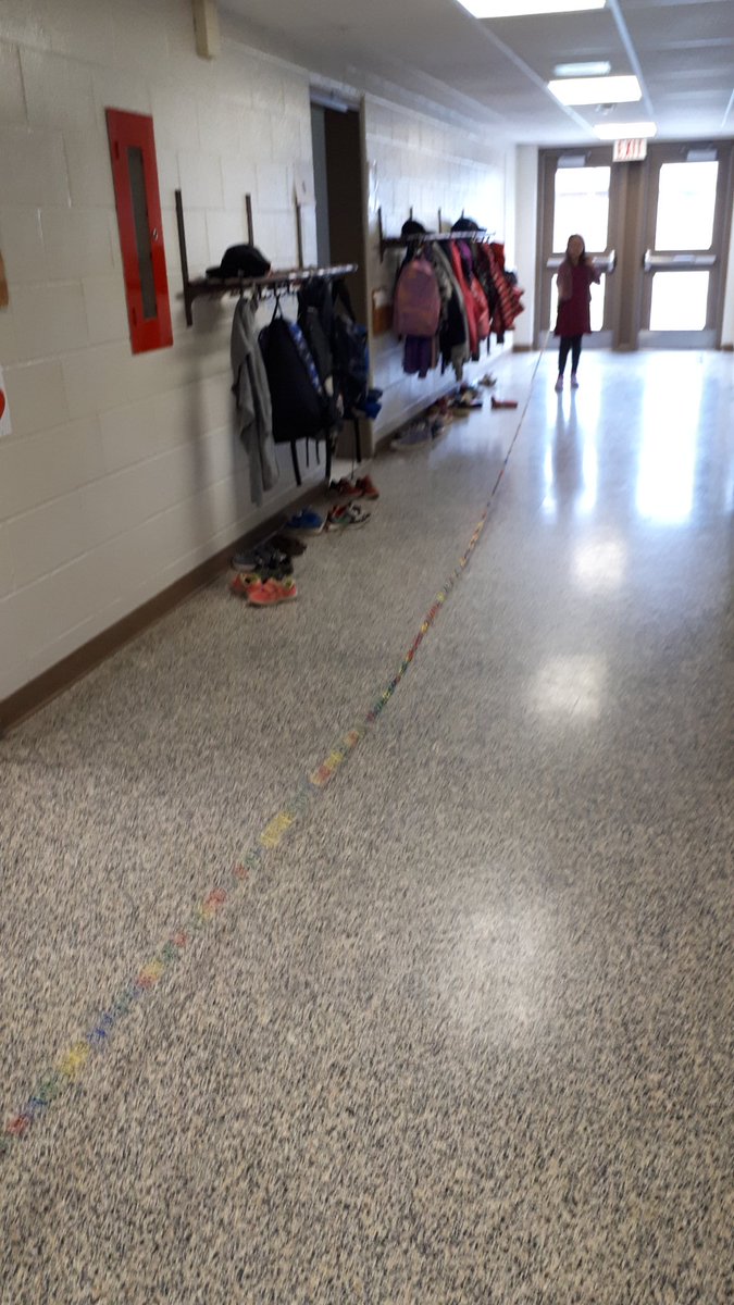 SMCDSB_OLL's tweet photo. Students in Grade 2/3 measure the length of our Primary hallway. https://t.co/JFQlLEHOaV