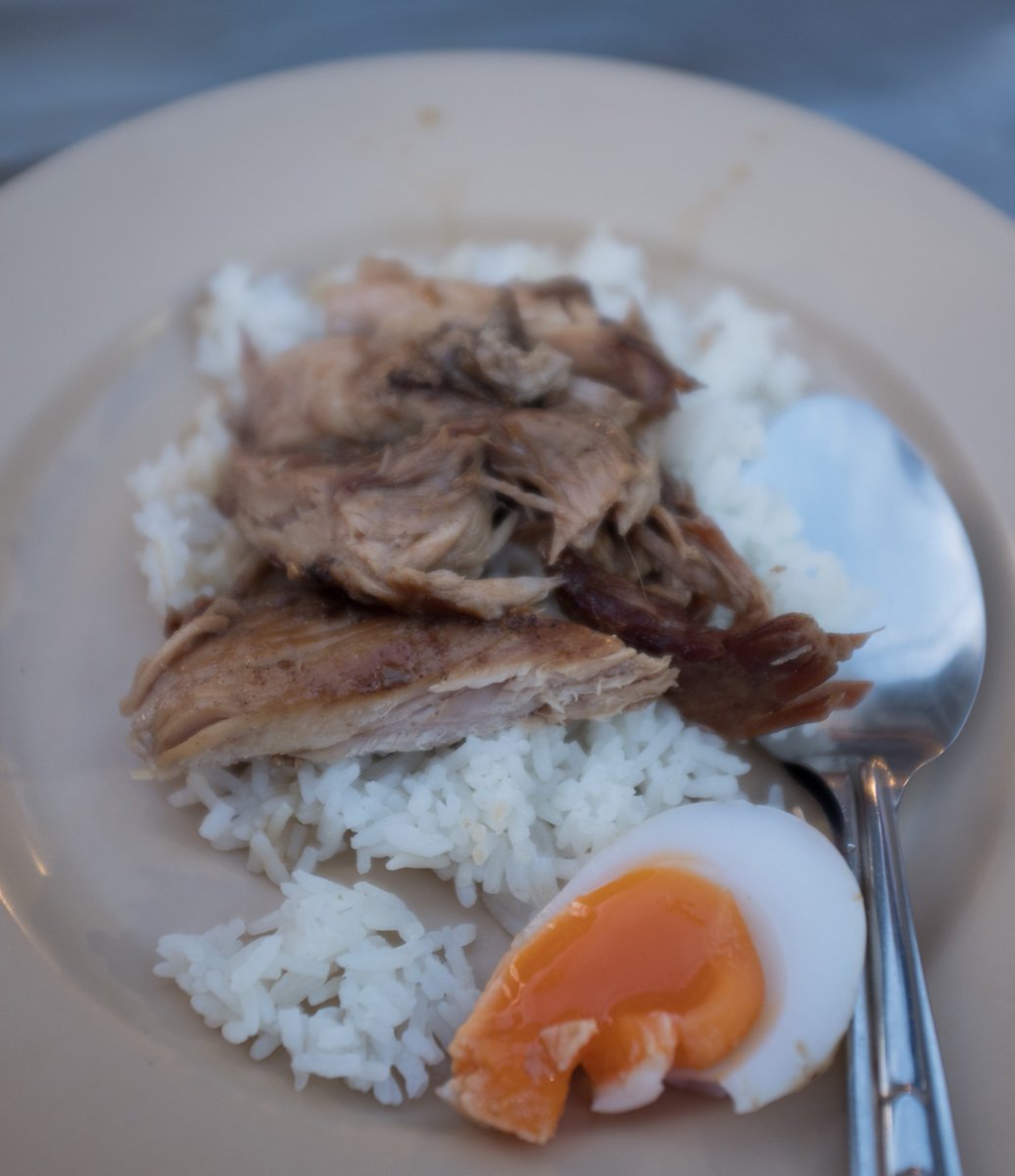 An obligatory stop at Khao Khao Moo Chang Phueak - also known as The Cowboy Hat Lady - for pork leg with mustard greens, soft boiled egg and rice.   I'm always skeptical of "must try" dining stops- but this stand absolutely lived up to it reputation!