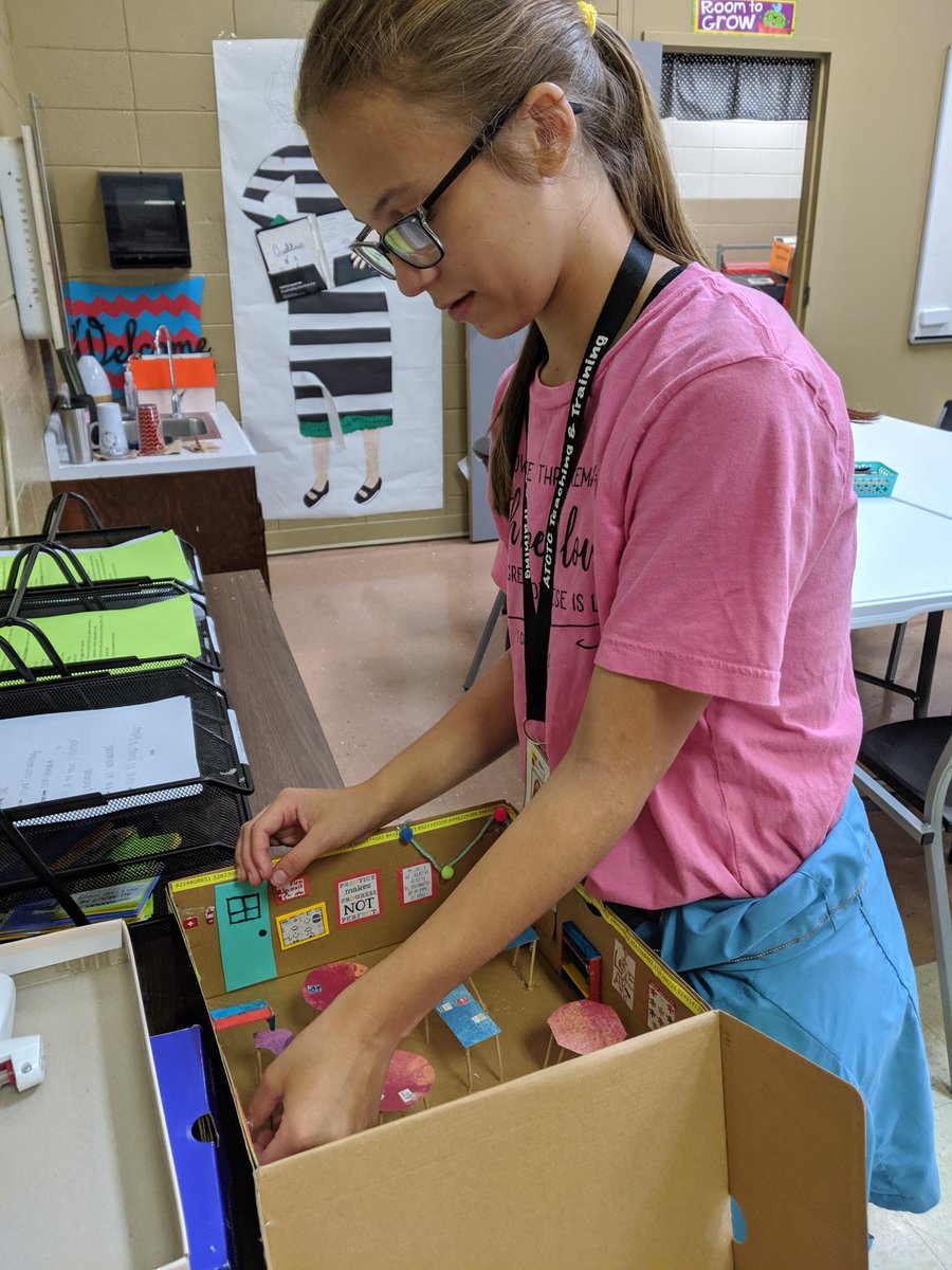 ATteach_train's tweet photo. Making final touches on shoebox classrooms. We use this activity to describe a conducive #learningenvironment. Students worked with a partner to create their physical "classroom" and to develop a #GoogleSlides describing each of the components. #futureteachers @LaudCoSS https://t.co/CBNoAxnLwq