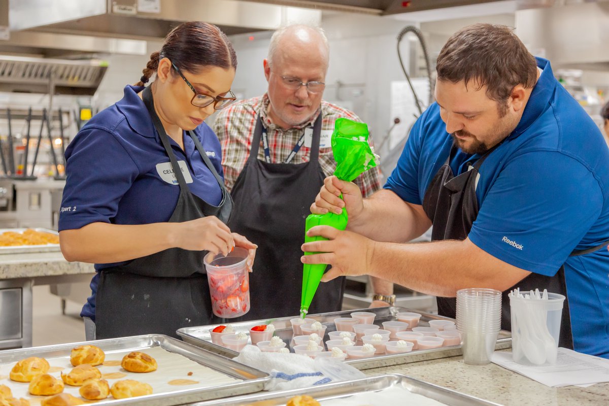FrancisTuttle's tweet photo. Instructors from Schlumberger Oilfield Services visited Francis Tuttle today for some #teambuilding. The group toured Workforce and Economic Development before heading to Culinary Arts where they donned aprons, split into teams and discovered who makes the best cream puffs. https://t.co/KrwkdaixVB