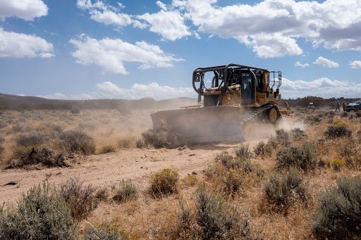 KUER's tweet photo. @davidmfuchs (5/6) Bulldozers have been one of the most effective tools for creating “lines” to contain the #NeckFire. But after the fire is controlled, the same machines must cover their tracks with cleared brush to rehabilitate the landscape. https://t.co/2PY5sg2AtP