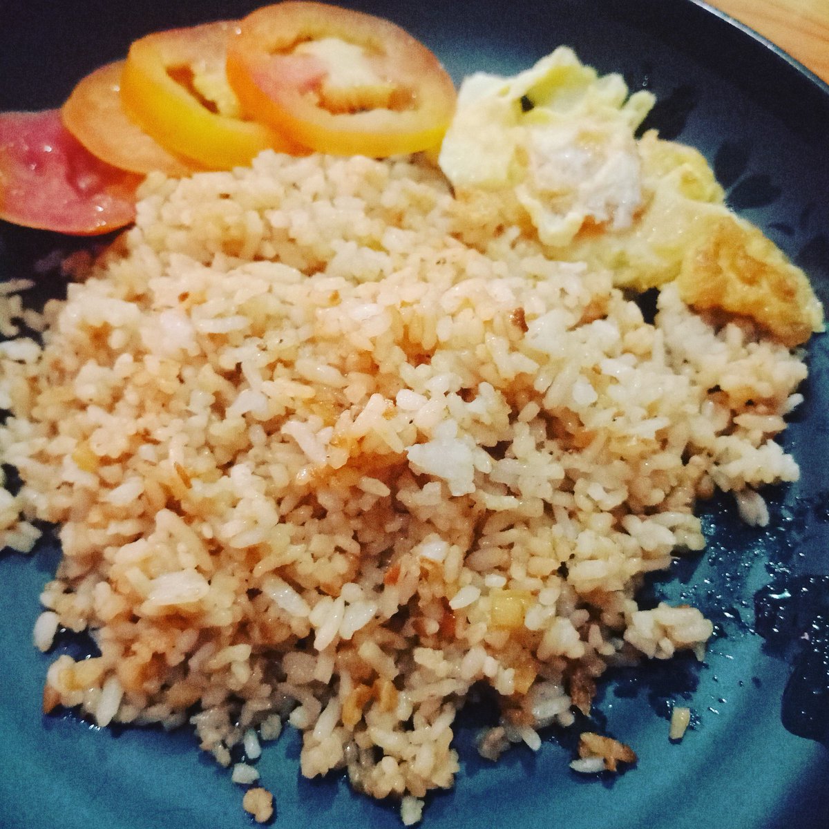 Iamtal2's tweet photo. #BreakfastInBed 
Binagoongan rice w/ kamatis at itlog https://t.co/l2q1IDVfjv