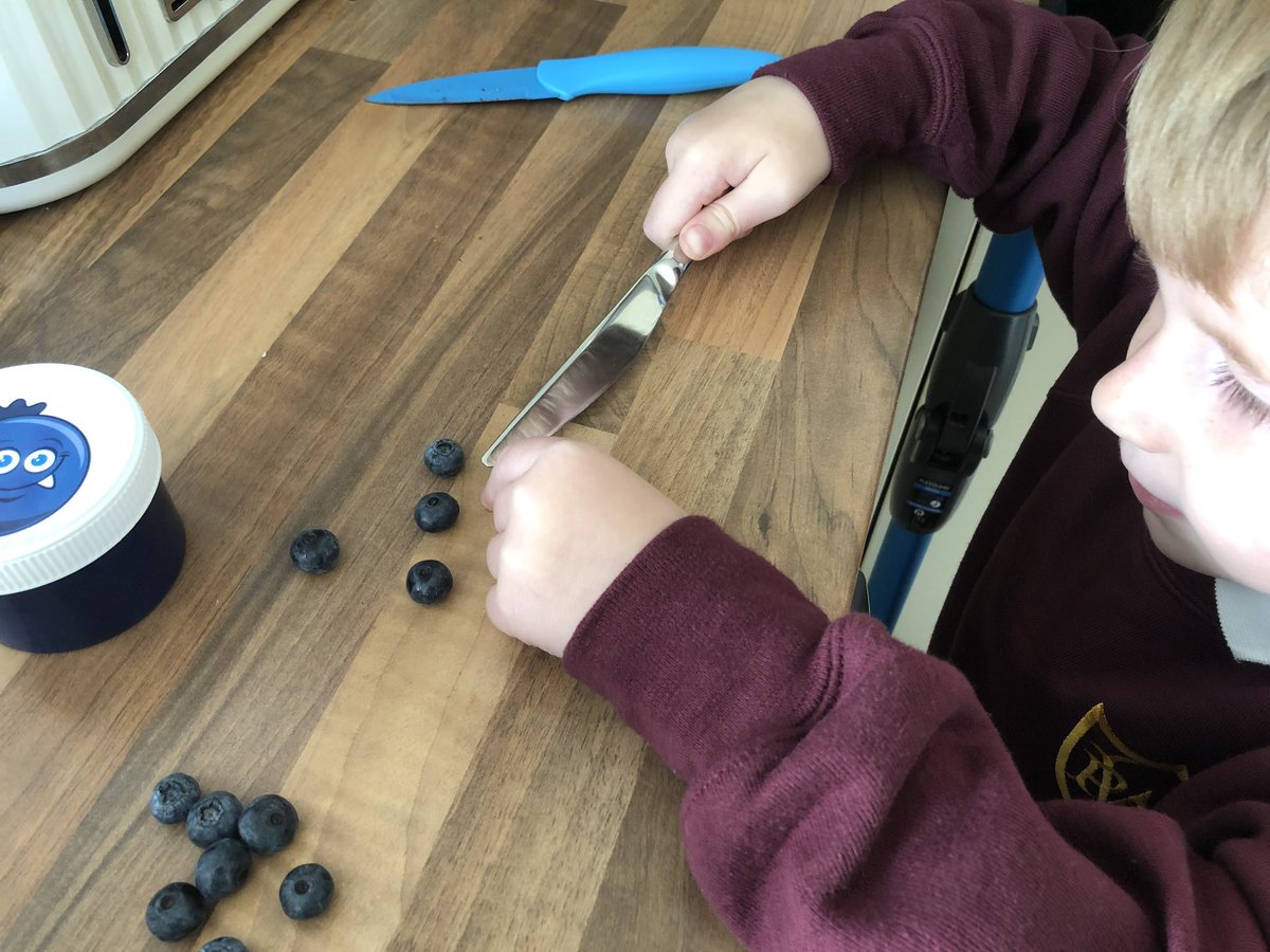 lew_call's tweet photo. @P1S_Westquarter Adam counting and cutting how many blueberries he’s taking for his lunch today . https://t.co/YARn4sr1mk